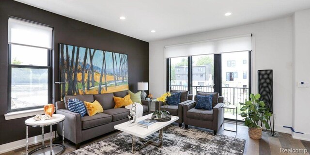 1058 Hampton Cir Unit 74, Detroit, MI 48207 - living area with wood finished floors and recessed lighting