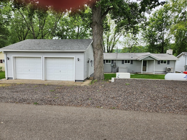 368 Old Hickory Dr, Coldwater, MI 49036 - single story home with an outbuilding, a garage, and a shingled roof