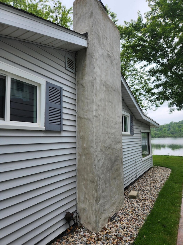 368 Old Hickory Dr, Coldwater, MI 49036 - view of side of property featuring a water view and a chimney
