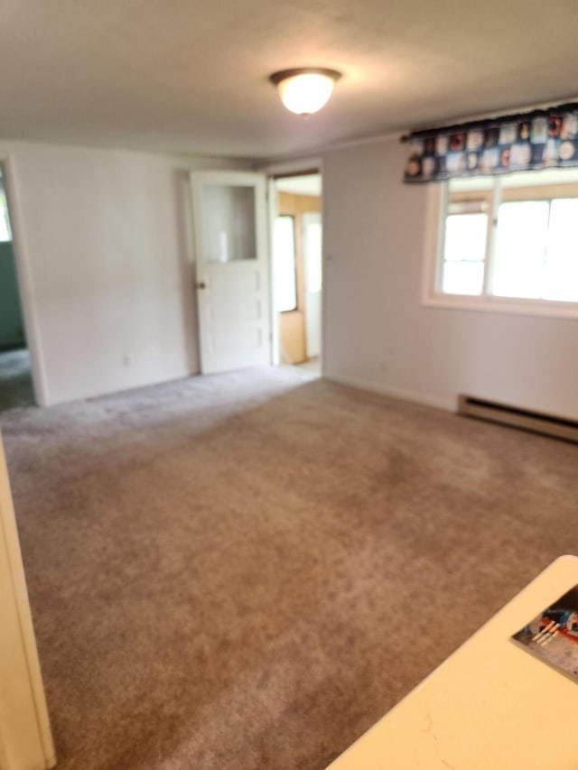 368 Old Hickory Dr, Coldwater, MI 49036 - carpeted empty room with baseboard heating