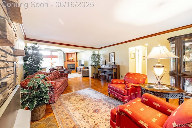 21781 Thorofare Rd, Grosse Ile, MI 48138 - living area featuring a fireplace, ornamental molding, and wood finished floors