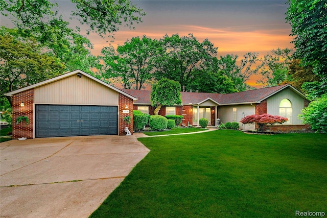 21781 Thorofare Rd, Grosse Ile, MI 48138 - ranch-style home featuring a garage, a front lawn, and brick siding