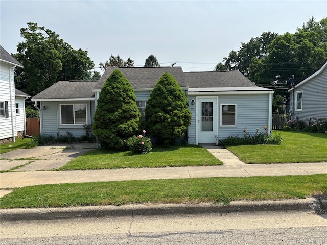59 W High St, Metamora, MI 48455 - view of front of property with a shingled roof
