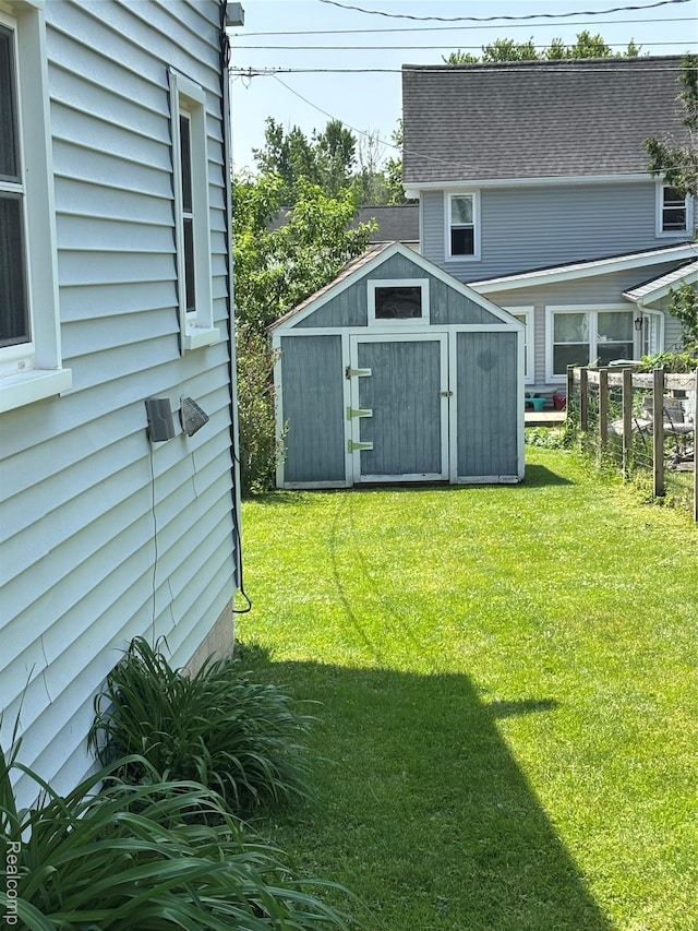 59 W High St, Metamora, MI 48455 - view of green lawn with a shed