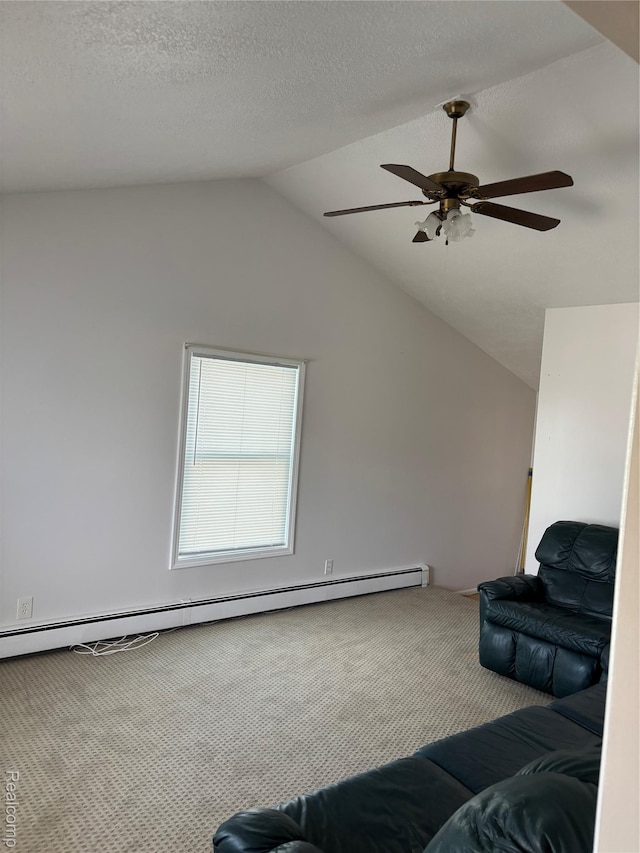 59 W High St, Metamora, MI 48455 - living area featuring carpet flooring, a baseboard radiator, lofted ceiling, and a ceiling fan