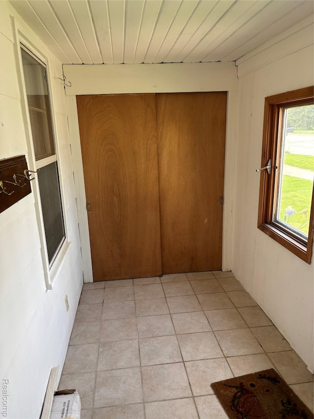 59 W High St, Metamora, MI 48455 - corridor with light tile patterned floors