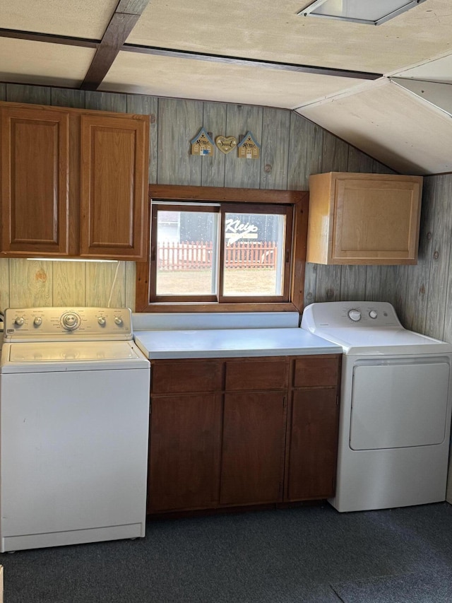 1026 Yeomans St, Ionia, MI 48846 - washroom featuring cabinet space, independent washer and dryer, and wood walls