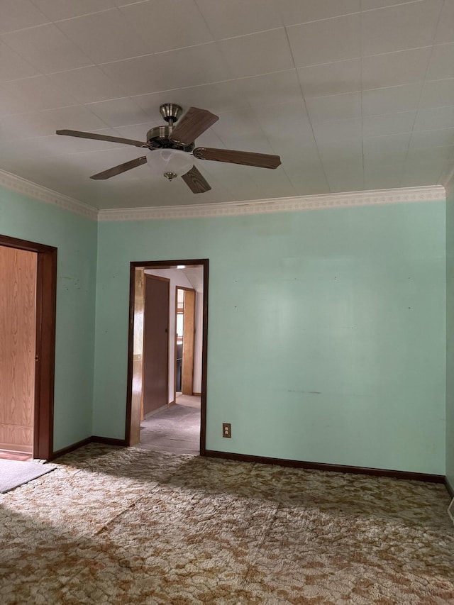 1026 Yeomans St, Ionia, MI 48846 - carpeted spare room featuring ornamental molding and a ceiling fan