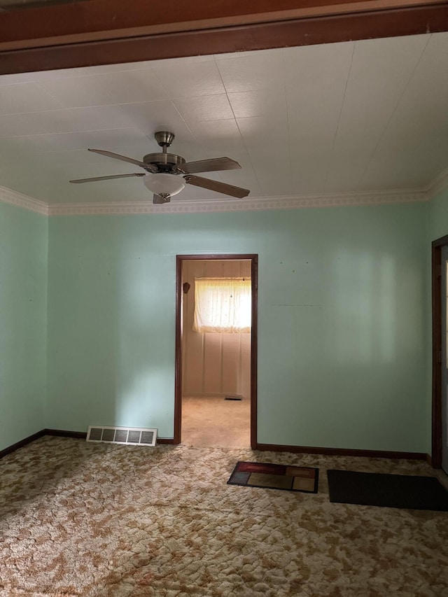 1026 Yeomans St, Ionia, MI 48846 - carpeted empty room with a ceiling fan and ornamental molding