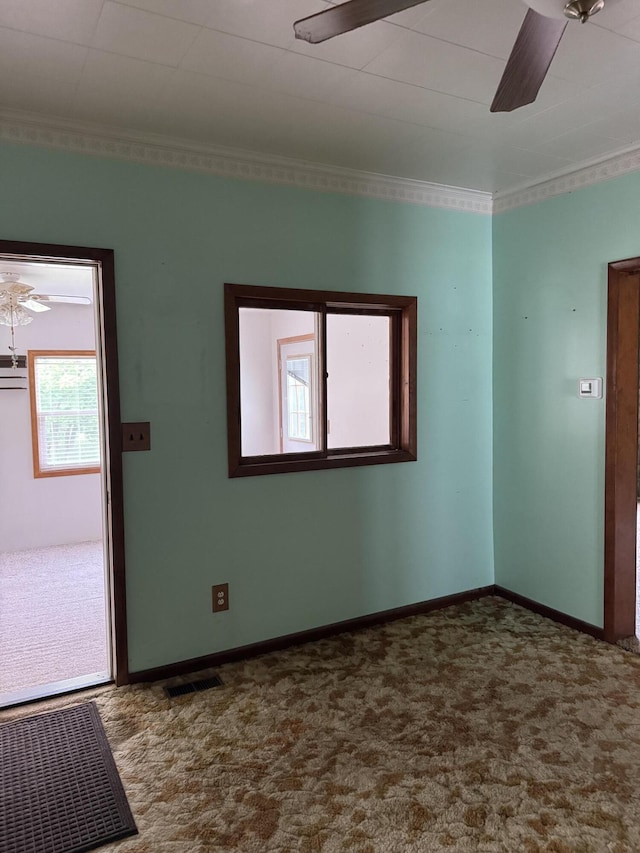 1026 Yeomans St, Ionia, MI 48846 - unfurnished room with a ceiling fan, carpet, and ornamental molding