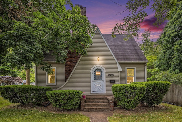 5147 N Riverview Dr, Kalamazoo, MI 49004 - a-frame style home with a chimney and a shingled roof