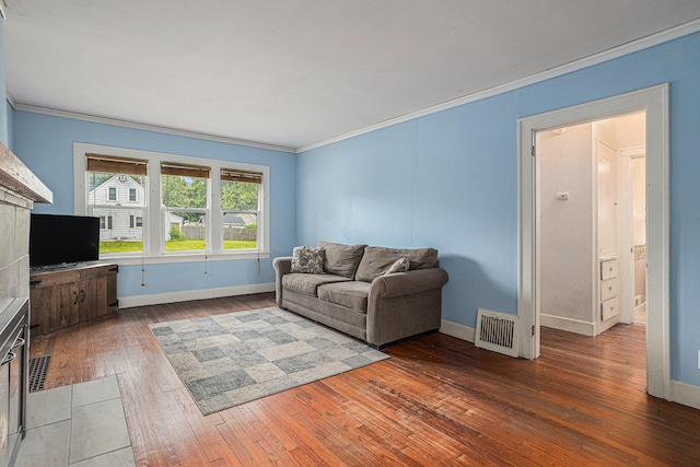 5147 N Riverview Dr, Kalamazoo, MI 49004 - living area with ornamental molding, hardwood / wood-style flooring, and a fireplace