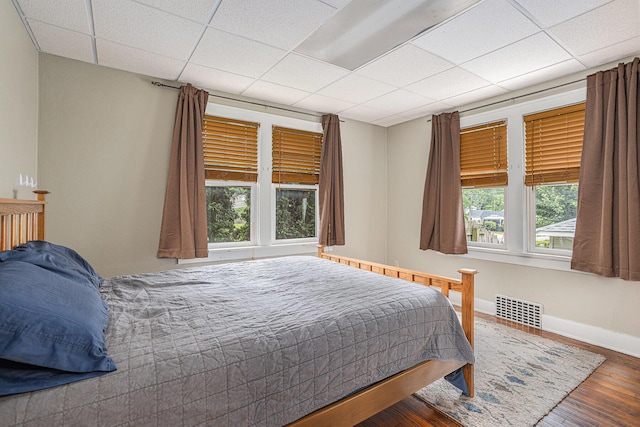 5147 N Riverview Dr, Kalamazoo, MI 49004 - bedroom with a paneled ceiling and wood finished floors