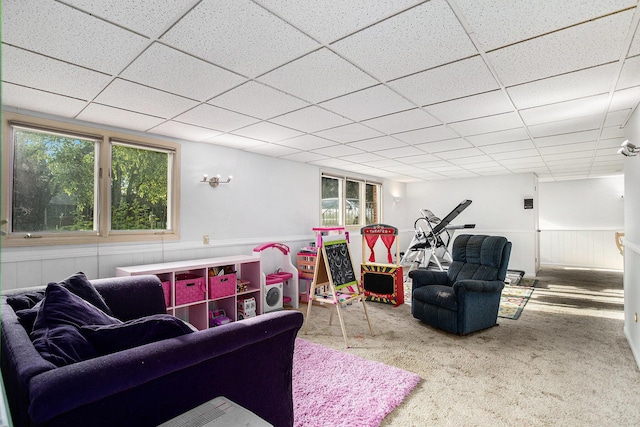 6958 Paddock Ln, Jackson, MI 49201 - living area with carpet floors and a paneled ceiling
