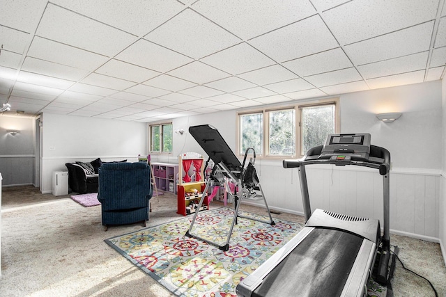 6958 Paddock Ln, Jackson, MI 49201 - workout room with healthy amount of natural light, carpet floors, and a paneled ceiling