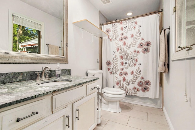 6958 Paddock Ln, Jackson, MI 49201 - full bath featuring vanity, tile patterned floors, and shower / bath combo with shower curtain