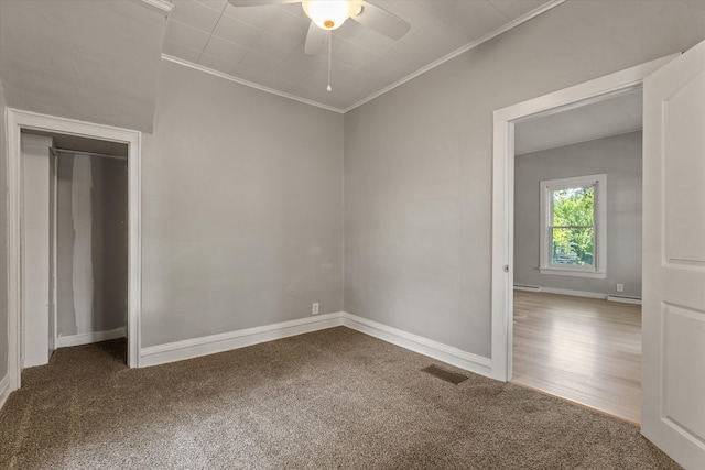 1334 Regent St, Niles, MI 49120 - unfurnished bedroom featuring crown molding, carpet floors, and a ceiling fan