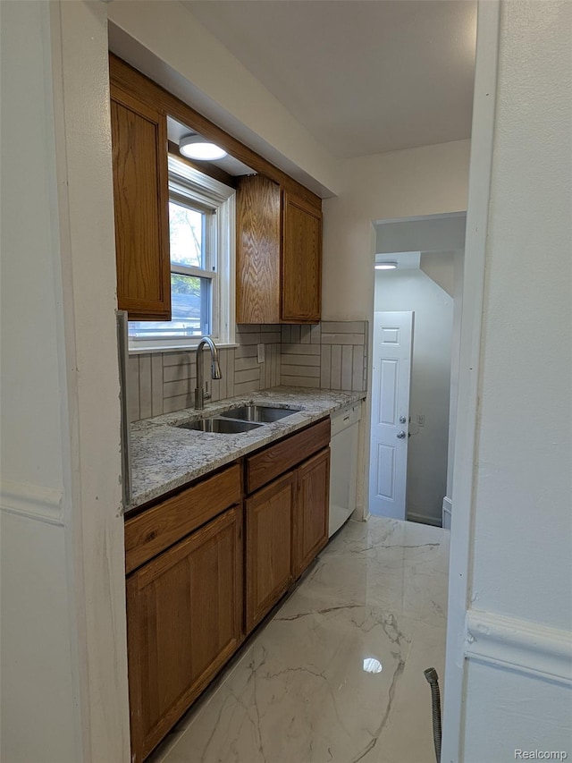 19947 Kinloch, Redford, MI 48240 - kitchen featuring white dishwasher, brown cabinetry, tasteful backsplash, and light marble finish floors