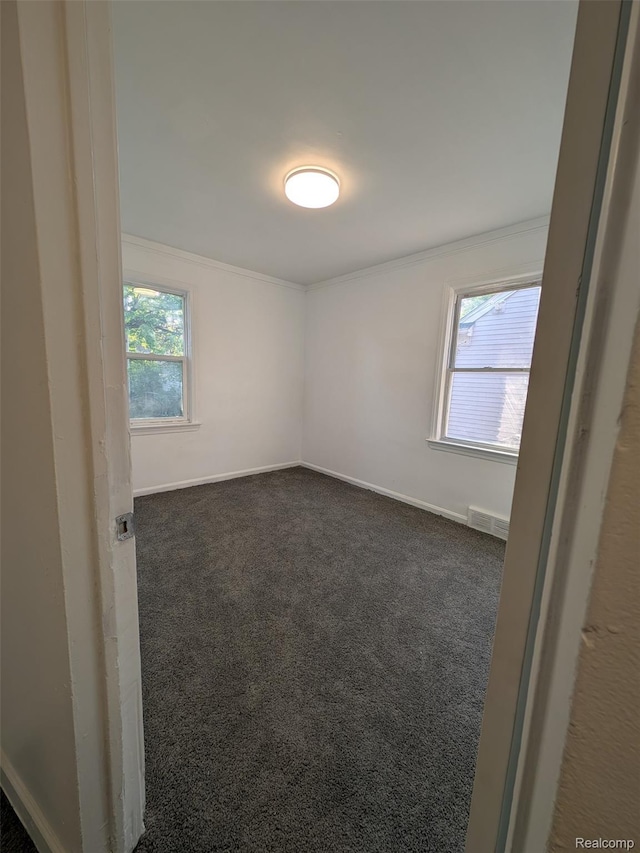 19947 Kinloch, Redford, MI 48240 - unfurnished room with dark colored carpet and ornamental molding