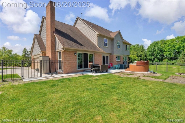 100 Mornington Ct, Canton, MI 48188 - rear view of property with a hot tub, a chimney, brick siding, and a patio
