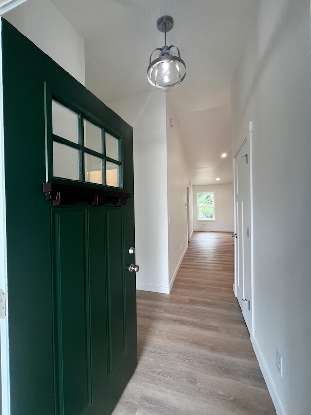 2959 Polaris Ave, Kalamazoo, MI 49004 - hallway featuring light wood-style flooring, recessed lighting, and vaulted ceiling