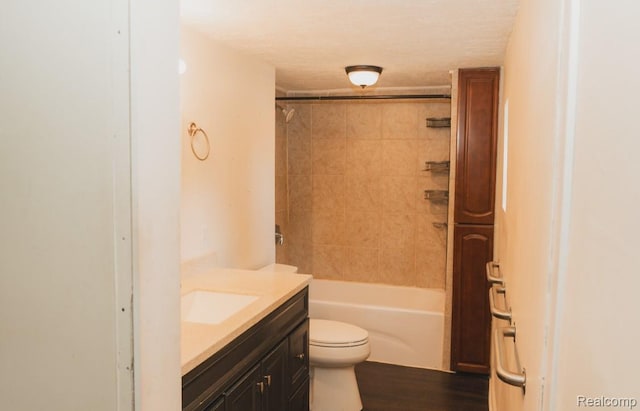 11709 Old Belding Rd NE, Belding, MI 48809 - bathroom featuring vanity, wood finished floors, and tub / shower combination