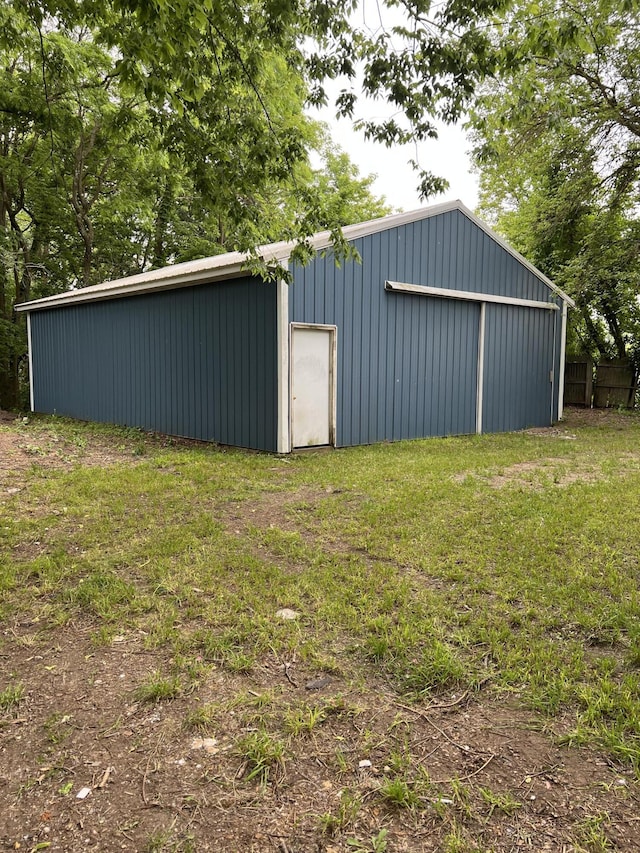 102 Allett St, Allegan, MI 49010 - view of green lawn featuring a pole building and an outdoor structure