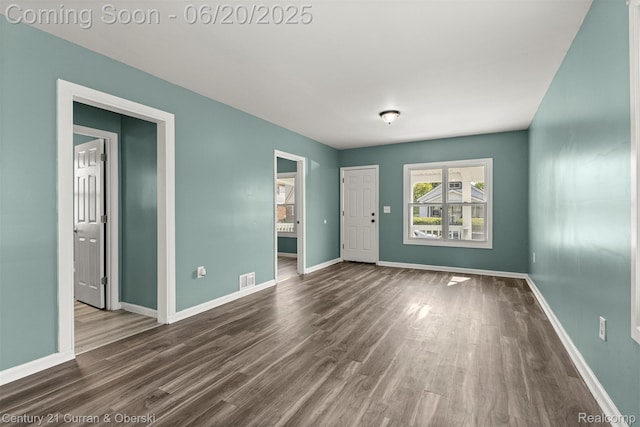 9045 Burnette St, Detroit, MI 48204 - unfurnished room with dark wood finished floors and baseboards