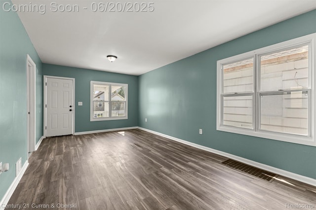 9045 Burnette St, Detroit, MI 48204 - unfurnished room with wood finished floors and baseboards