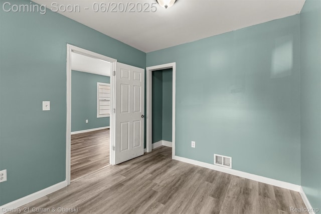 9045 Burnette St, Detroit, MI 48204 - spare room with baseboards and wood finished floors