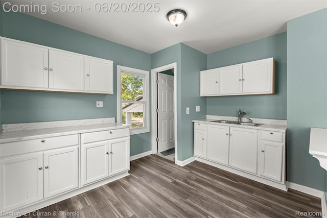 9045 Burnette St, Detroit, MI 48204 - kitchen featuring dark wood-style floors, white cabinetry, and light stone counters