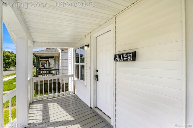 9045 Burnette St, Detroit, MI 48204 - doorway to property with a porch