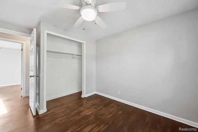 31740 Nelson Dr, Warren, MI 48088 - unfurnished bedroom featuring dark wood-type flooring, a closet, and a ceiling fan
