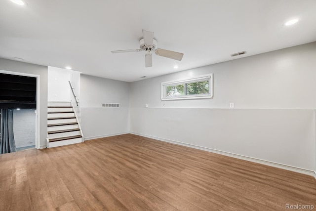31740 Nelson Dr, Warren, MI 48088 - basement featuring a ceiling fan, wood finished floors, stairs, and recessed lighting