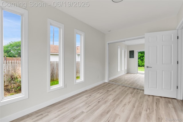 25044 Comfort, Center Line, MI 48015 - spare room with light wood-style flooring and electric panel