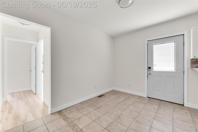 25044 Comfort, Center Line, MI 48015 - foyer with light tile patterned flooring and baseboards