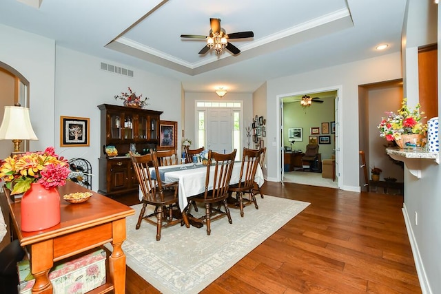 8734 Oakland Hills Cir Unit 6, Portage, MI 49024 - dining space with a tray ceiling, a ceiling fan, wood finished floors, ornamental molding, and recessed lighting