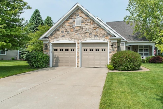 8734 Oakland Hills Cir Unit 6, Portage, MI 49024 - craftsman house featuring stone siding, a garage, driveway, and a front yard