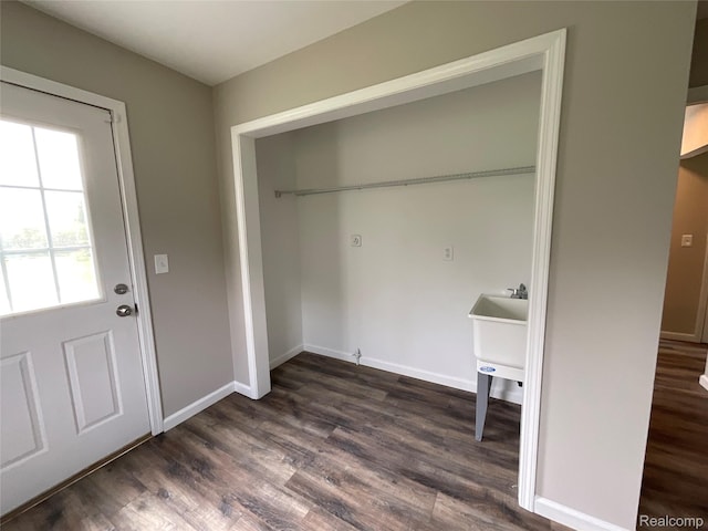 3615 N Mill Rd, Dryden, MI 48428 - washroom featuring dark wood-style floors and baseboards