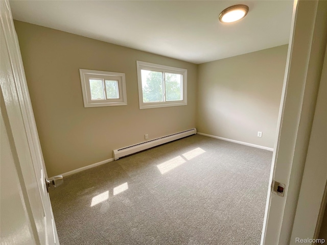 3615 N Mill Rd, Dryden, MI 48428 - unfurnished room with baseboard heating and carpet flooring