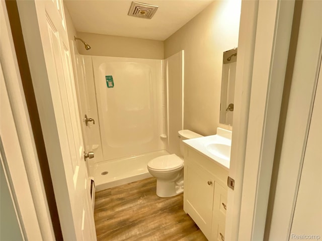 3615 N Mill Rd, Dryden, MI 48428 - bathroom featuring wood finished floors, a shower, and vanity