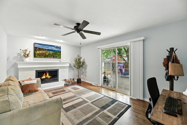1548 Old Hickory Ln, Saint Joseph, MI 49085 - living room featuring wood finished floors, a brick fireplace, and ceiling fan