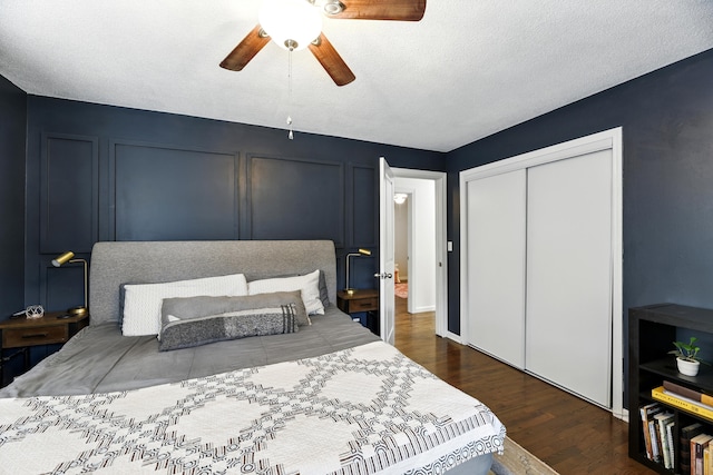 1548 Old Hickory Ln, Saint Joseph, MI 49085 - bedroom featuring dark wood finished floors, a closet, and a ceiling fan