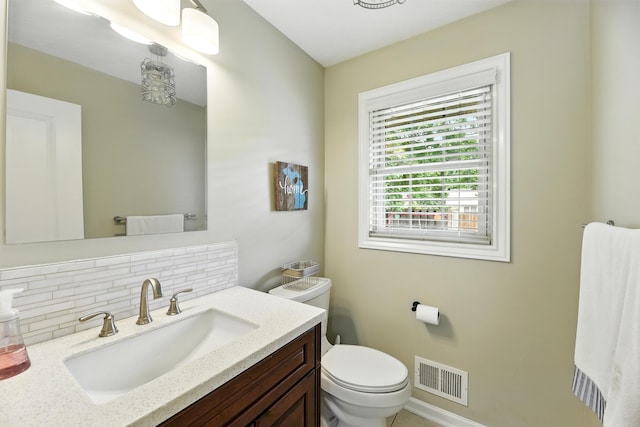 1548 Old Hickory Ln, Saint Joseph, MI 49085 - half bathroom with decorative backsplash and vanity