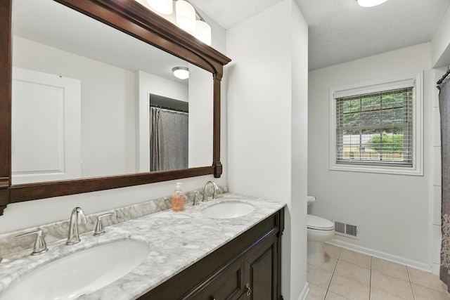 1548 Old Hickory Ln, Saint Joseph, MI 49085 - bathroom with double vanity, tile patterned flooring, and a shower with shower curtain