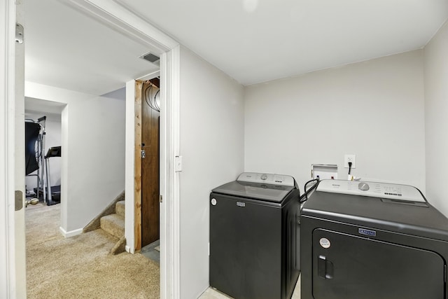 1548 Old Hickory Ln, Saint Joseph, MI 49085 - washroom featuring washer and dryer and light colored carpet