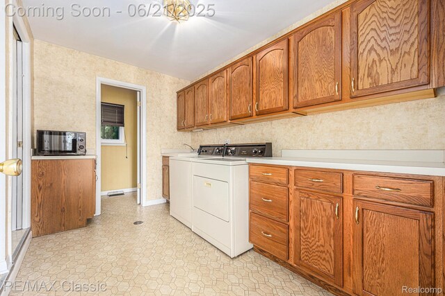 1925 Dawn Ridge Rd, Commerce Twp, MI 48390 - washroom with washer and dryer and cabinet space