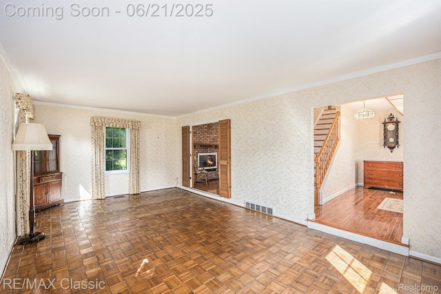 1925 Dawn Ridge Rd, Commerce Twp, MI 48390 - unfurnished living room with crown molding and wallpapered walls
