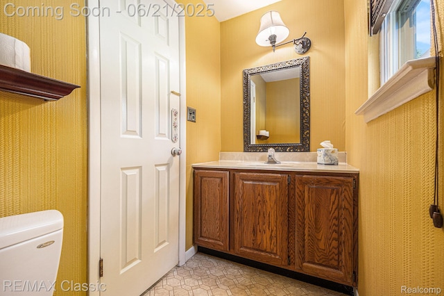 1925 Dawn Ridge Rd, Commerce Twp, MI 48390 - half bathroom with vanity and tile patterned flooring