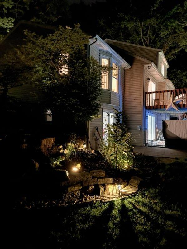 13421 Woodland Ct, Big Rapids, MI 49307 - view of home's exterior featuring a wooden deck
